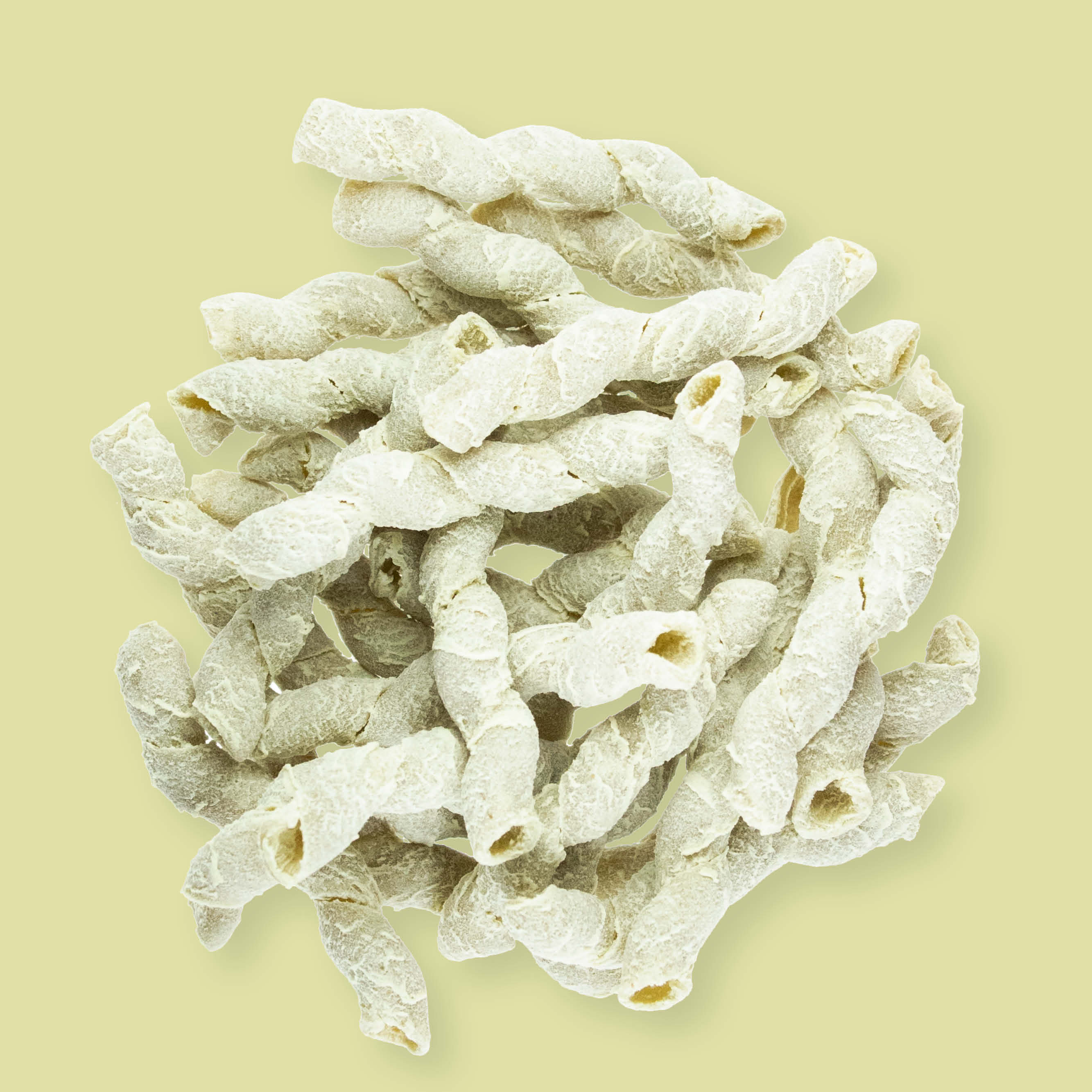 Bio Pistazien Busiata Pasta Nahaufnahme der antiken und bronzegezogenen Urgetreide-Qualität Bio Pistazien Busiata Pasta Nahaufnahme der antiken und bronzegezogenen Urgetreide-Qualität
